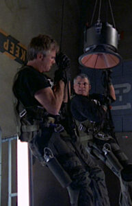 Jack and Frank rappelling with the bomb